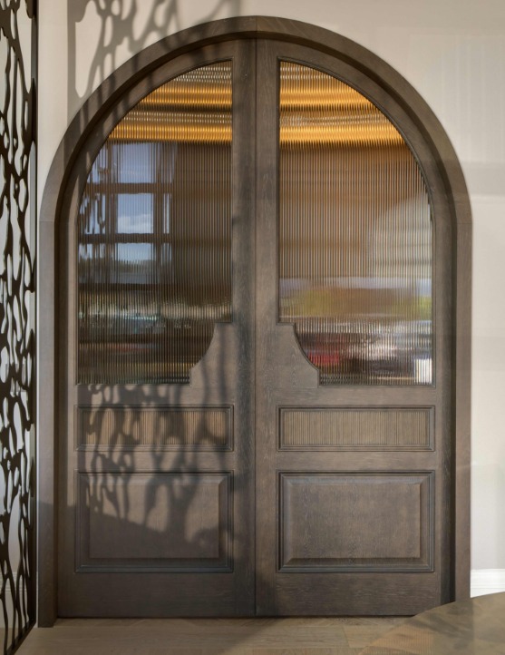 Arched double door with reeded glass and classic panels